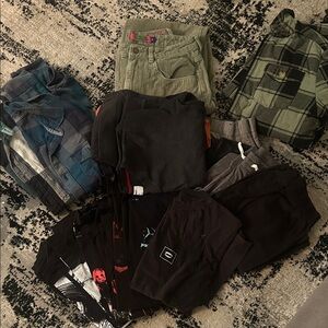 Box of boys clothes size range from 12-14